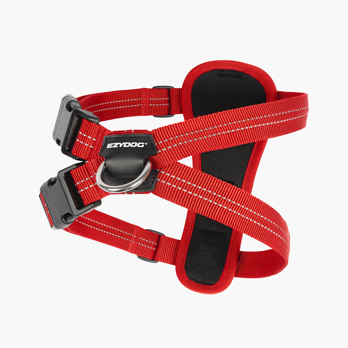 Red dog harness with black padding on a white background