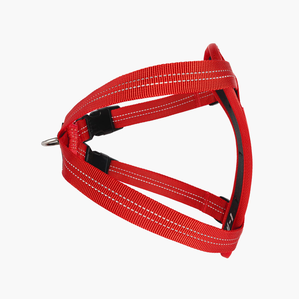 Red dog harness with black straps on a white background
