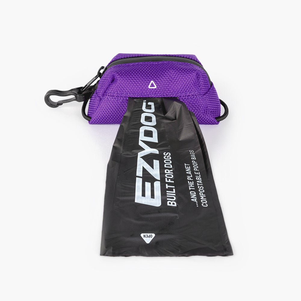 Purple pet waste bag holder with black drawstring bag featuring 'EzyDog' branding on a white background.