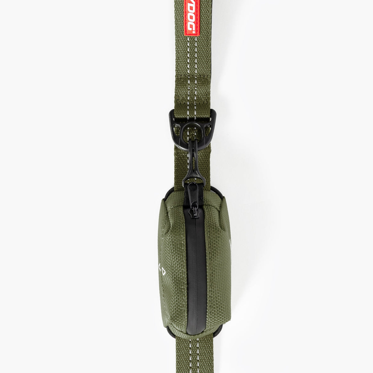 Green dog leash and collar set with a red tag on a white background