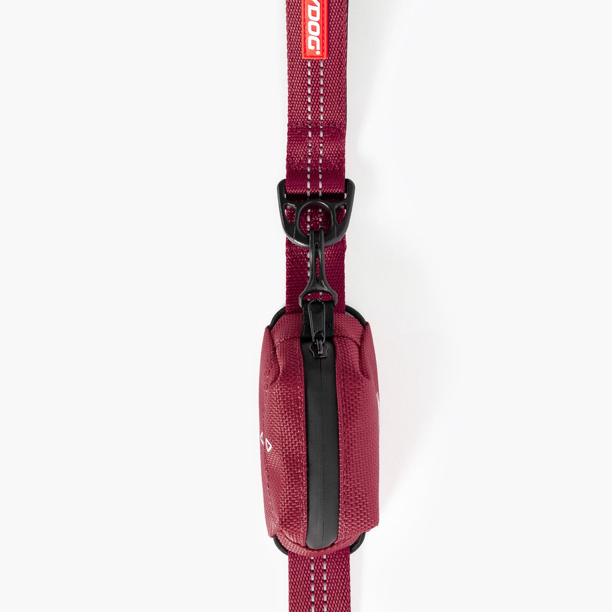 Red dog leash with a black clip on a white background